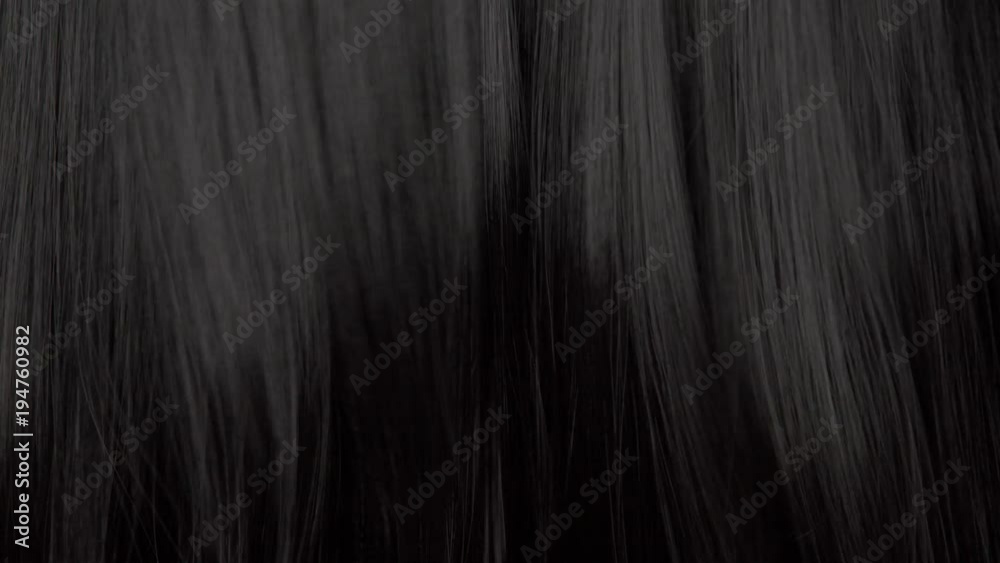 Hair texture background, no person. Black shiny hair moving slowy Hair texture background, no person. Black shiny hair moving slowy