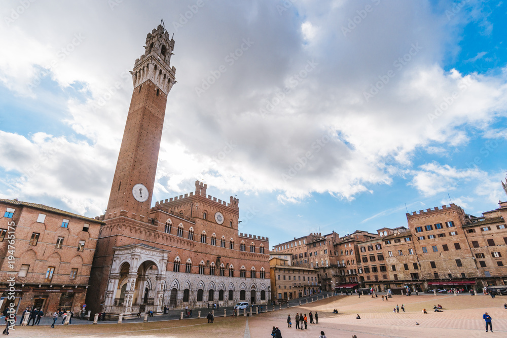 View of the magnificent square of the field with the famous tower called Mangia.