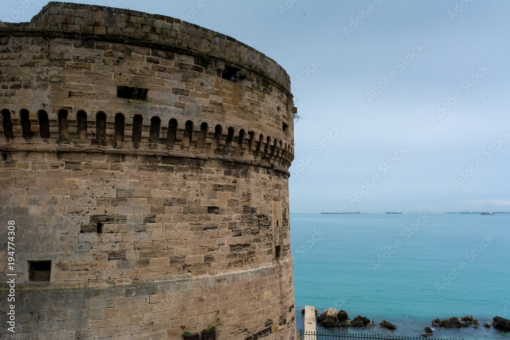 Horizontal View of One of the Stone Towers of The Aragonese Castle . Taranto, South Of Italy