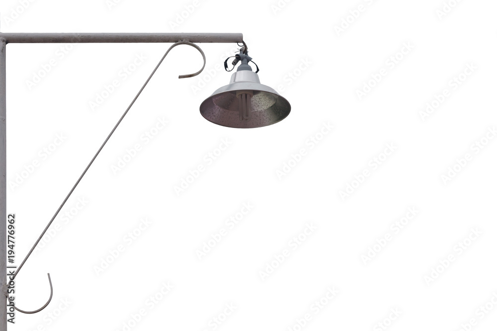 The lantern is hanging on the iron pillar. The lantern is hanging on the iron pillar.