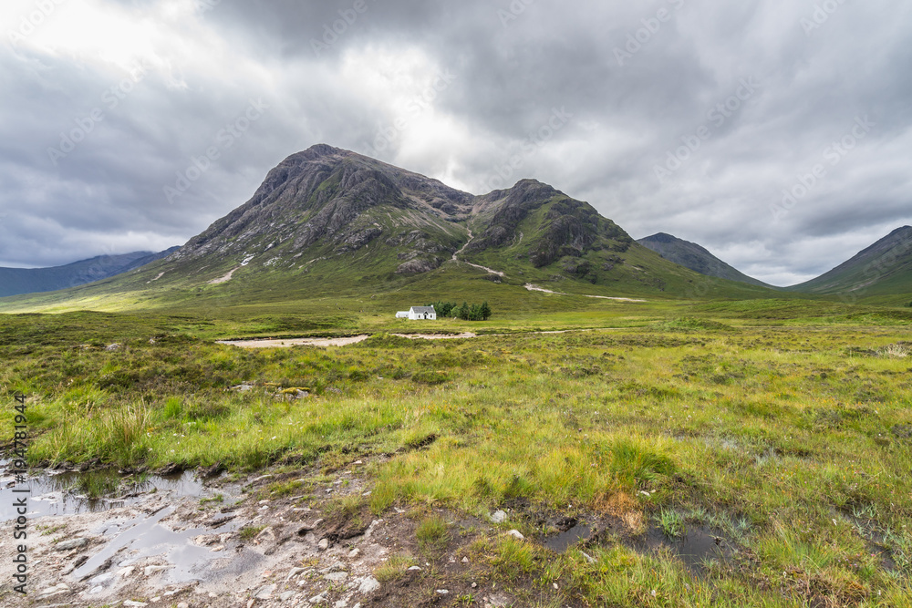 Buachaille Etive Mor and the Lagangarbh Cottage in Glencoe valley, Highlands, Scotland, Britain