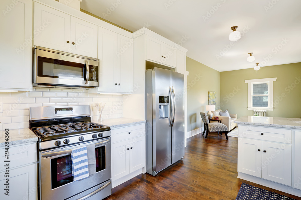 Freshly updated white and green kitchen room interior Freshly updated white and green kitchen room interior