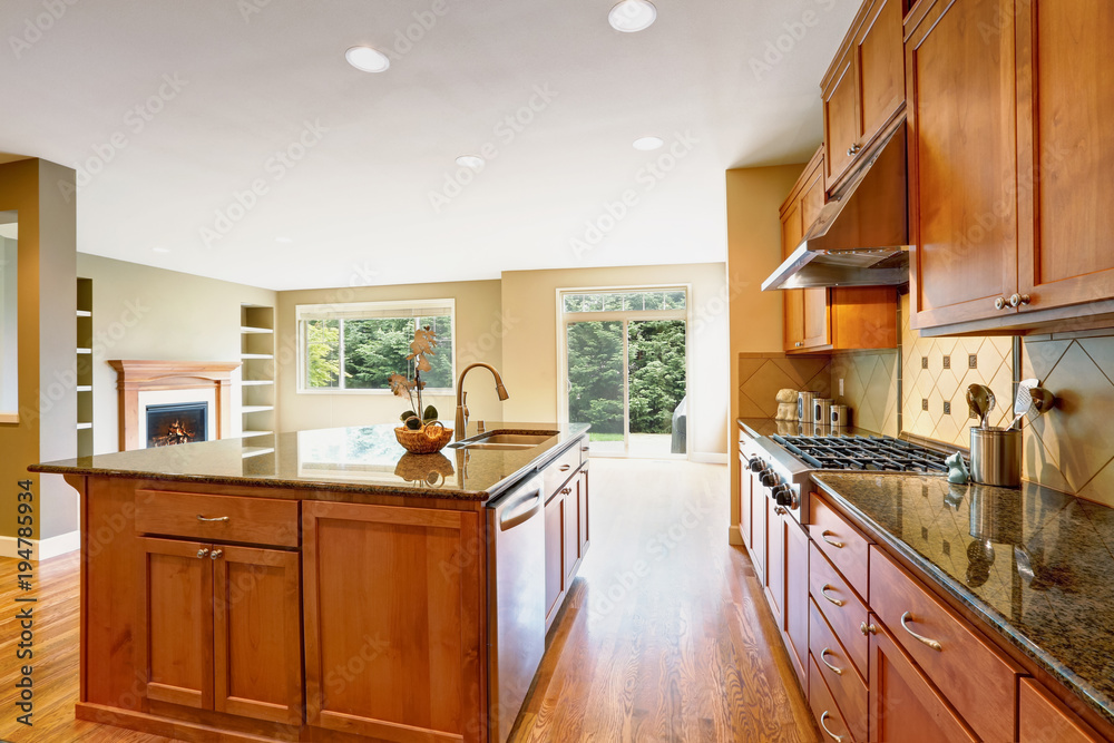Bright Inviting kitchen features granite counters. Bright Inviting kitchen features granite counters.