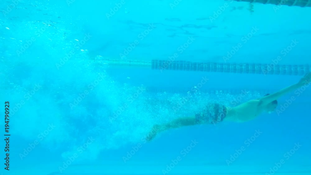 Swimmer Man Diving in Swimming Pool. HD Slowmotion Underwater Gopro Footage. Bali, Indonesia. Swimmer Man Diving in Swimming Pool. HD Slowmotion Underwater Gopro Footage. Bali, Indonesia.