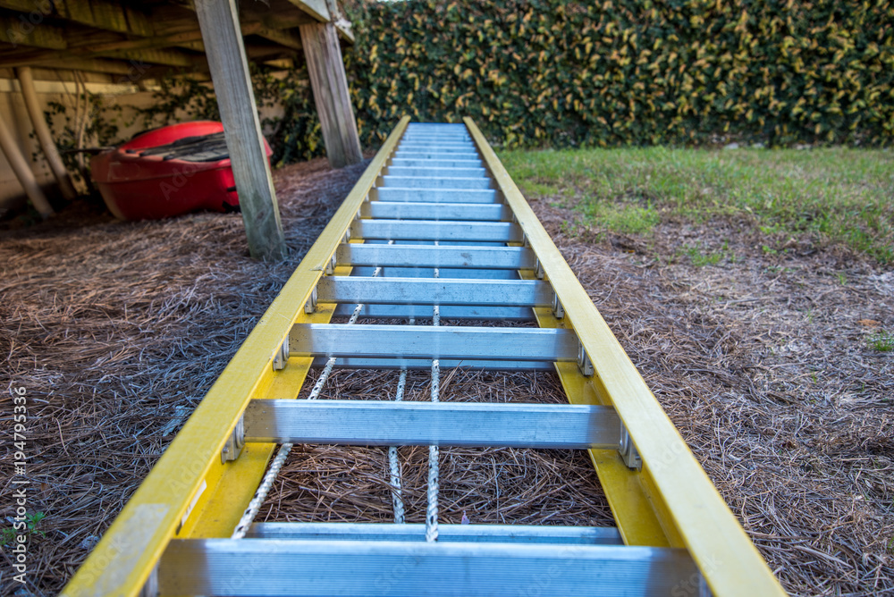Yellow Ladder on the ground 