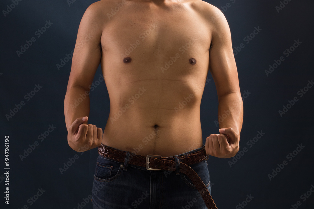 Young and healthy man shirtless with sexy man excitement show his muscles.