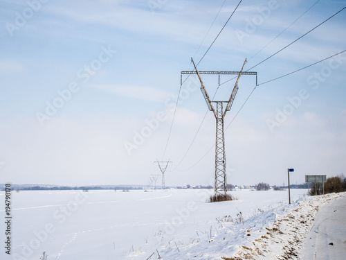 High voltage tower on a background of the winter sky. winter
