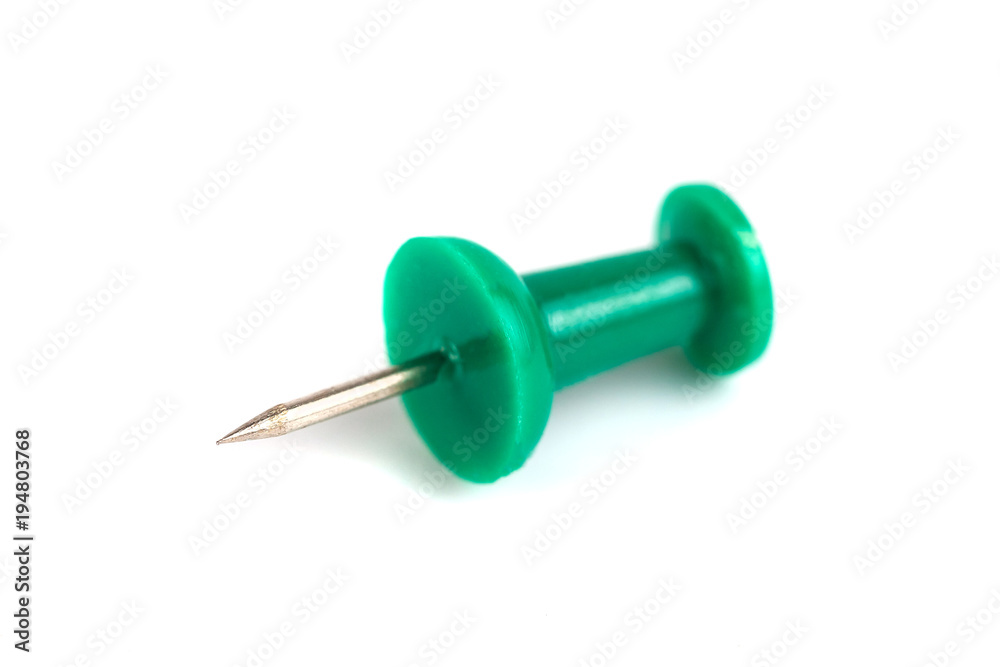 green push-pin isolated on the white background green push-pin isolated on the white background
