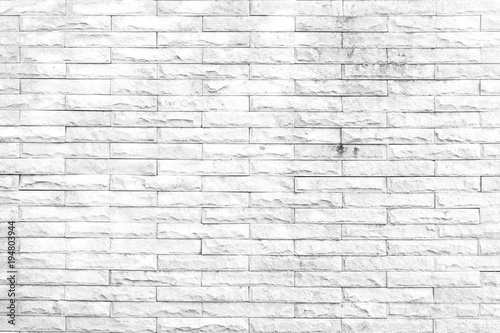 White stone brick wall texture and background for room.