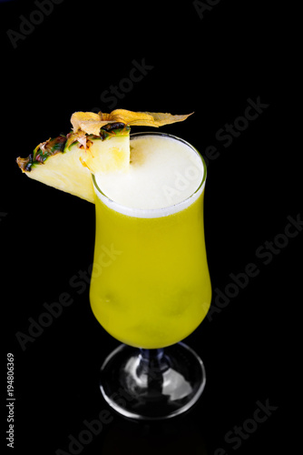 alcoholic cocktail on a black background with insulation photo