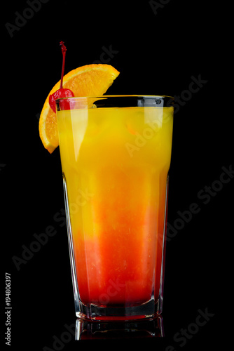 alcoholic cocktail on a black background with insulation photo