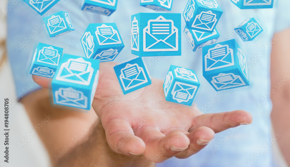 Businessman using floating cube emails 3D rendering Businessman using floating cube emails 3D rendering