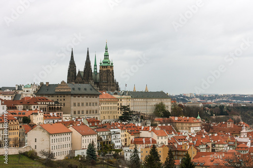Skyline of Prague old houses and St. Vitus Cathedral. View from Petrin hill park, Czech Republic © Leonid