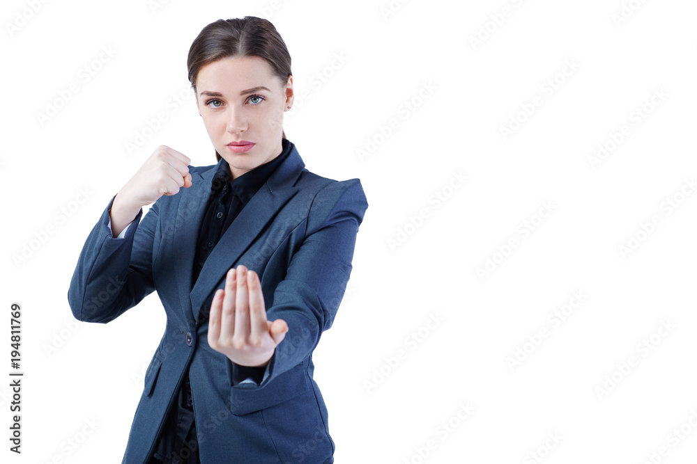 Young caucasian business woman in full length, ready for a fight isolated on white background.
