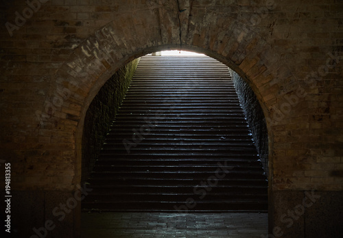 Cuadro en lienzo Arched passage with stairs in the fortress