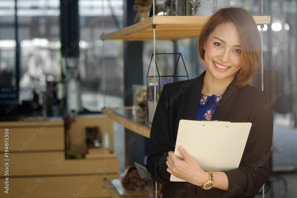 Secretary woman holding a document file and smile on face. Secretary woman holding a document file and smile on face.