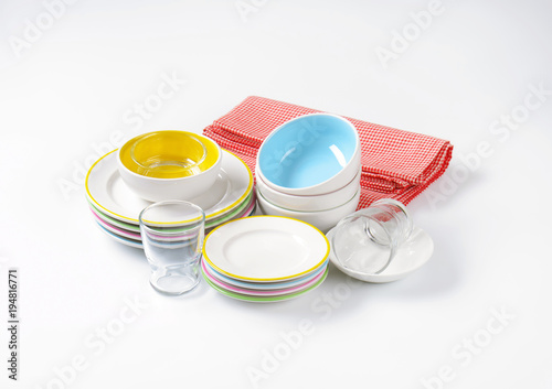 set of rimmed plates  bowls and glasses