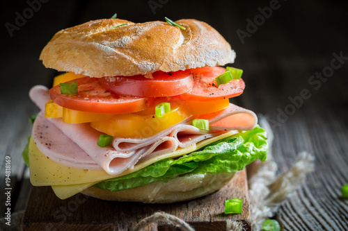 Crisp sandwich with vegetables and ham in the morning