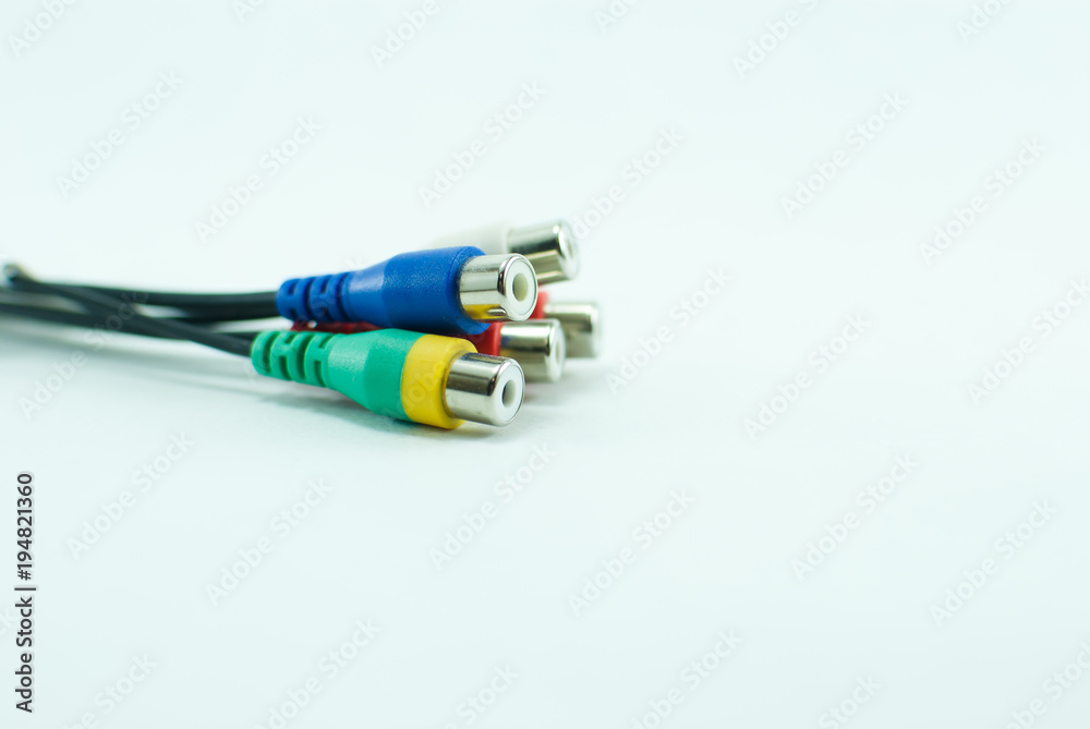 Five colorful wires, blue, red, green, and white, on a white background Five colorful wires, blue, red, green, and white, on a white background