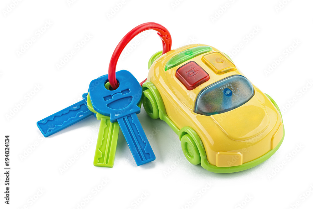 toy car and keys on white