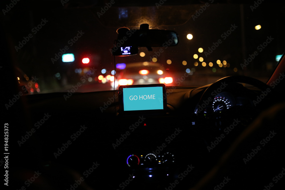 Monitor gps to go home in car at night background