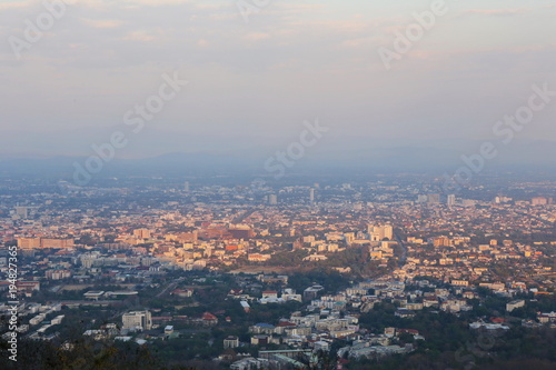 Chiang Mai city view at evening with sunbeam area highlight background, Thailand concept