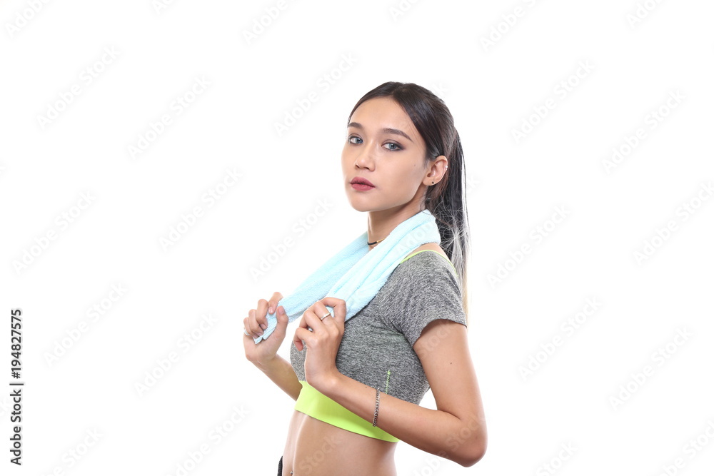Charming tan skin Asian woman with exercise suit hand hold pure water bottle isolated on white background, Presenting fitness and good healthy Charming tan skin Asian woman with exercise suit hand hold pure water bottle isolated on white background, Presenting fitness and good healthy