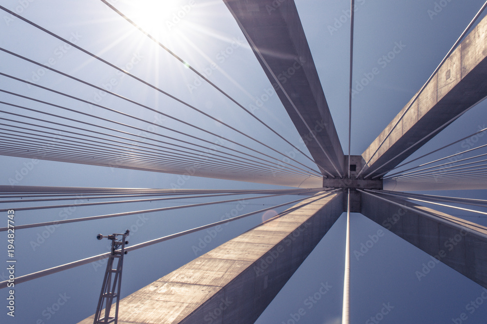 Cable stayed bridge. Architectural detail of the iconic Rio Antirio Bridge - Patras Greece. Inside view. Cable stayed bridge. Architectural detail of the iconic Rio Antirio Bridge - Patras Greece. Inside view.