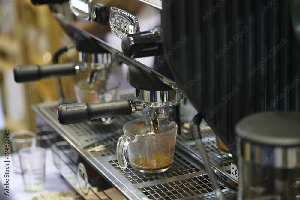 coffee machine in shop  ,Professional barista use manual brew machine making espresso in a cafe. Timer digital for control coffee temperature