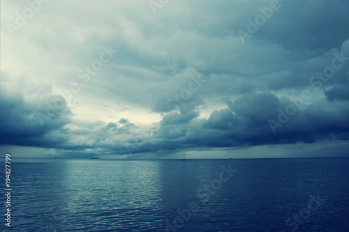 Dramatic storm clouds over the sea. Baltic Sea. Seascape in front of a storm.