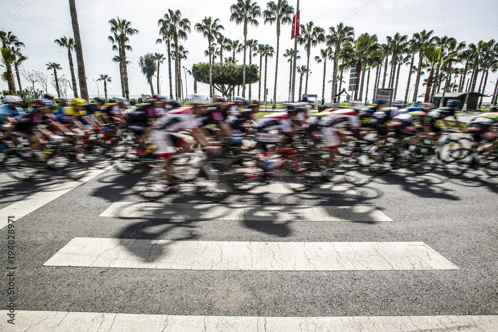 Fototapeta premium Competition cycling race on the road. Motion blur photo