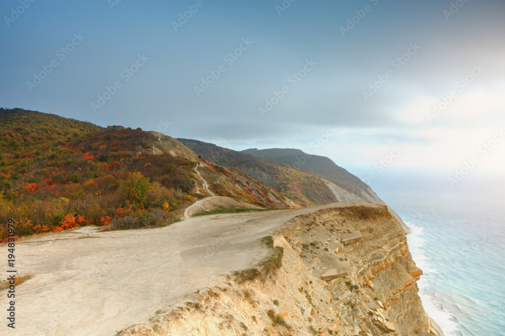 Mountains and a sea landscape with the blue sky. Black Sea, Russia.