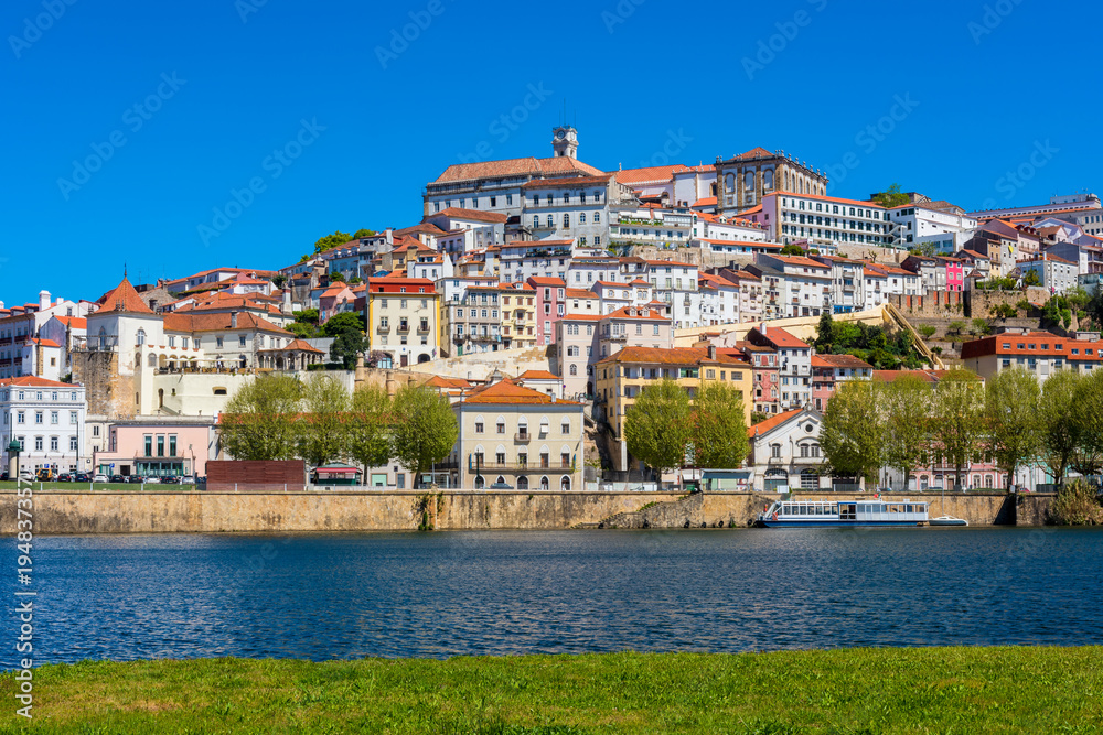 Obraz premium Coimbra Portugal as seen from across the Mondego River