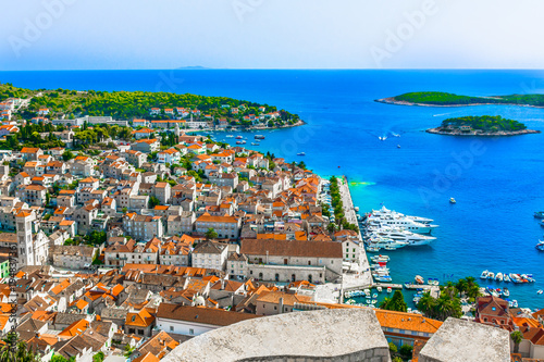 Hvar Mediterranean summer sea. / Aerial view at summer vivid colorful scenery in Croatia, Hvar town, famous luxury travel destination.