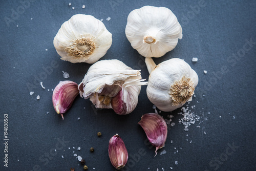 garlic on a stone table photo