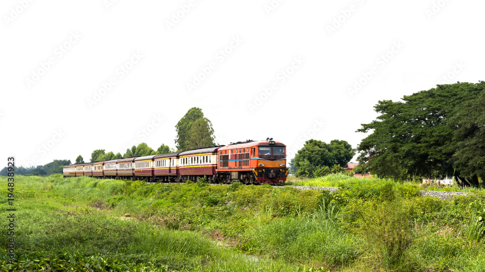 Train crossing Thai countryside.