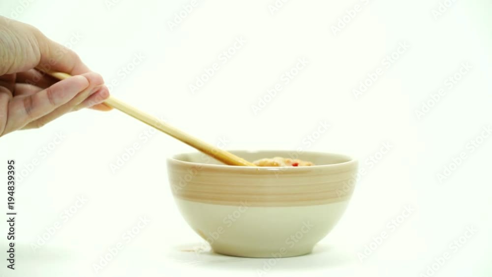 Sukiyaki dipping in sauce Sukiyaki dipping in sauce