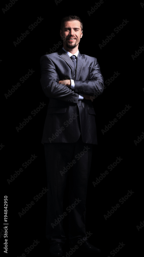 Close up portrait of a business man on black background Close up portrait of a business man on black background