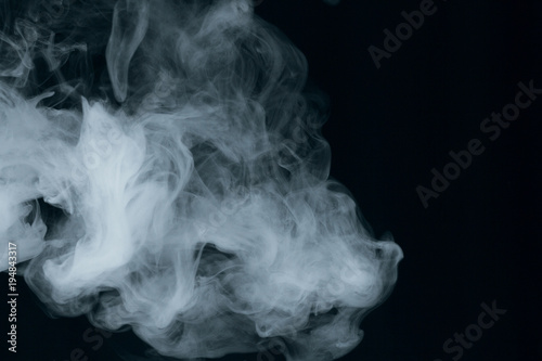 Texture of white smoke on a black background