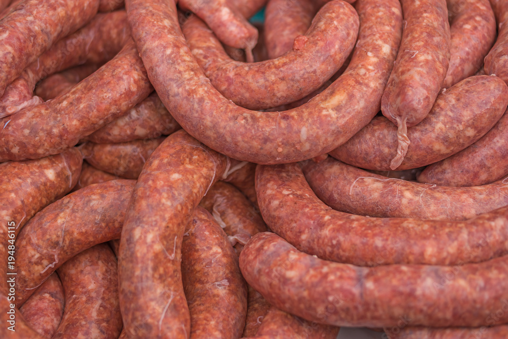 pile of raw sausages ready to cook or grill pile of raw sausages ready to cook or grill
