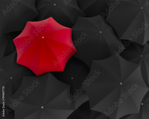 Top view of unique red umbrella standing out from the black crowd. 3d illustration