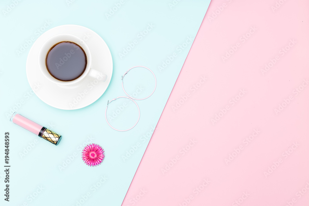 A cup of coffee and accessories on pastel background. Minimalist design  Stock Photo | Adobe Stock