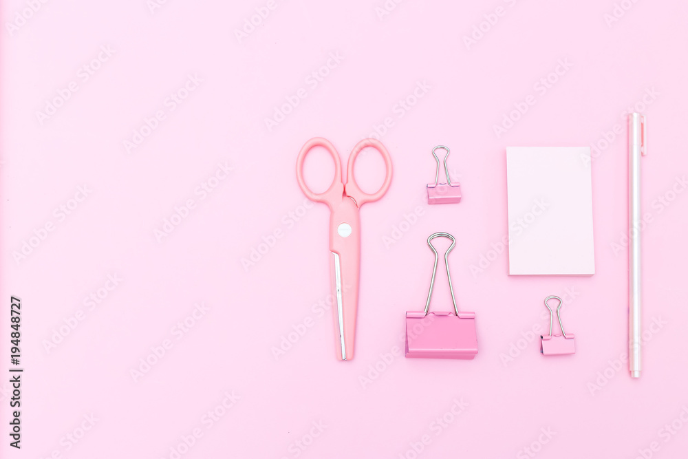 Pink stationery on pasrel background. Copy space Pink stationery on pasrel background. Copy space