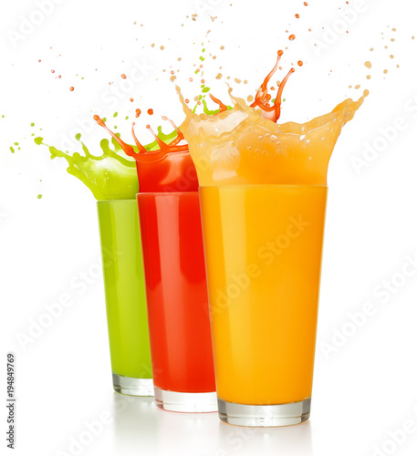 fruit juice glasses splashing isolated on white