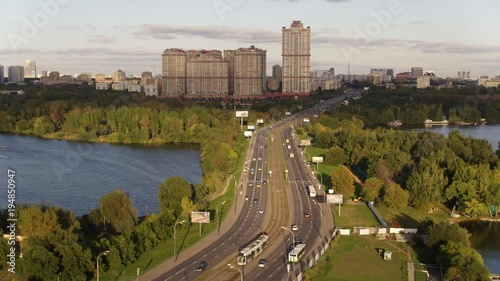 Aerial view of Moscow. Skyscrapers of housing complex Alye Parusa over Moskva River. Stroginsky bridge. Moscow, Russia. 4k photo