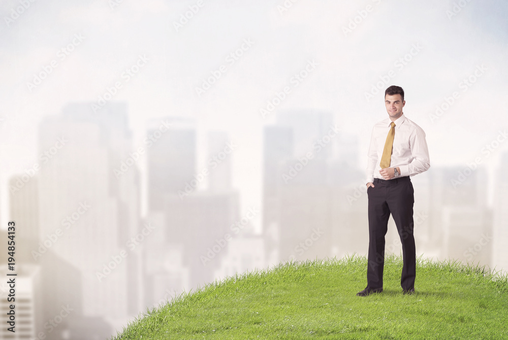 man standing in front of city landscape man standing in front of city landscape