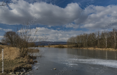 Fototapeta Naklejka Na Ścianę i Meble -  Pond with ice on Strizak hill in Usti nad Labem