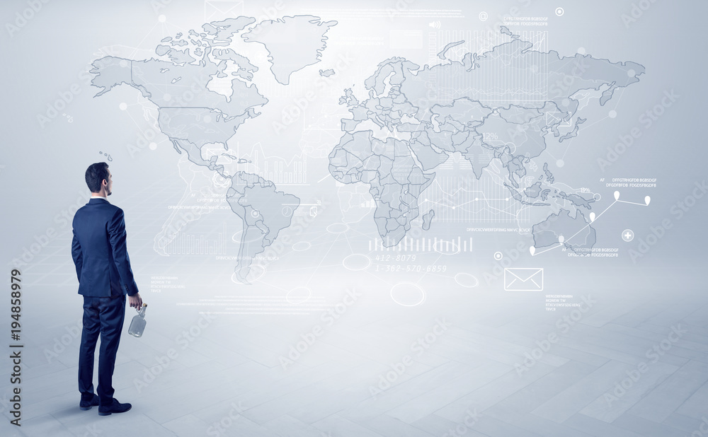Man looking at map with objects in his hand Man looking at map with objects in his hand