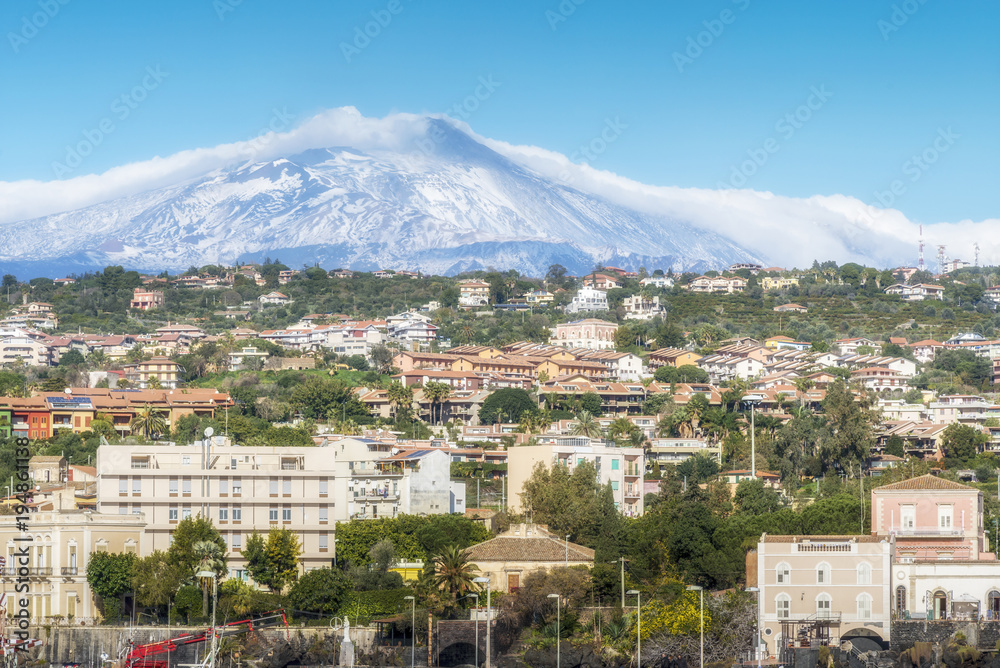 Catania city in Sicily with the Etna volcano on the background. Sicily. Italy.
