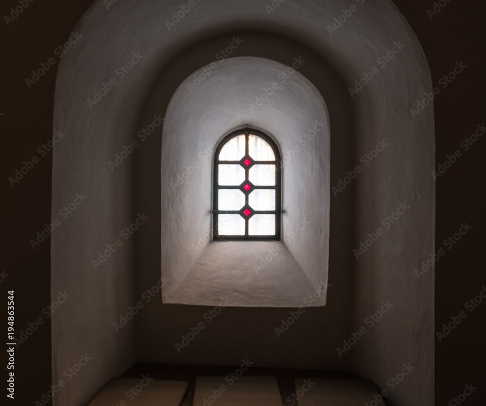 The old and ancient window in dark room